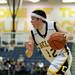 Chelsea senior Jayden Sweeny dribbles in the game against Pinckney during the Chelsea High Basketball Tournament on Friday, Dec. 28. Daniel Brenner I AnnArbor.com